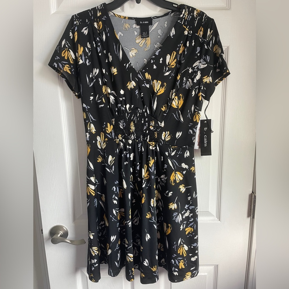 Black floral short dress. New with tags. Size large.